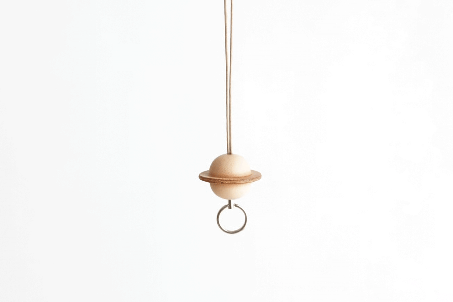 PLANET NECK HOLDER