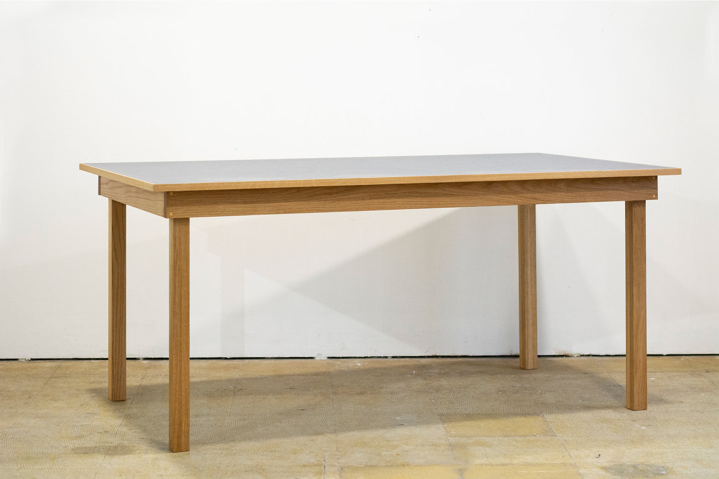 "Rail" Dining Table/Marmoleum Top